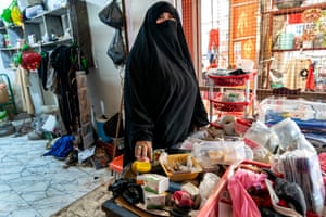 Zeinab Haida working at a market stall