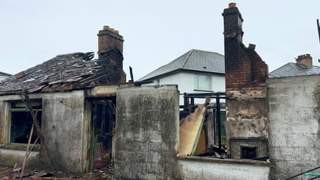 A house in the Sandyknowles area of Newtownabbey burnt out during the rioting in Belfast last night.