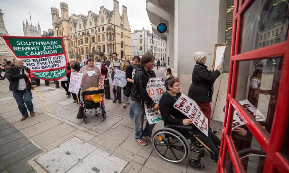 Members and supporters of Disabled People Against Cuts (DPAC) protesting in September 2014