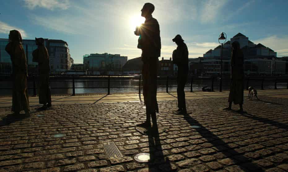 Statues commemorating the Great Famine in Ireland along the river Liffey in Dublin.