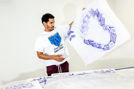 a man looking at a drawing