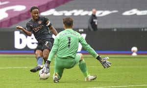 Lukasz Fabianski makes a crucial save to deny Raheem Sterling.