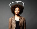 Gently smiling woman in a leather jacket with an imaginary halo above her head