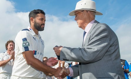 Yorkshire president John Hampshire presents Azeem Rafiq with his county cap in August 2016
