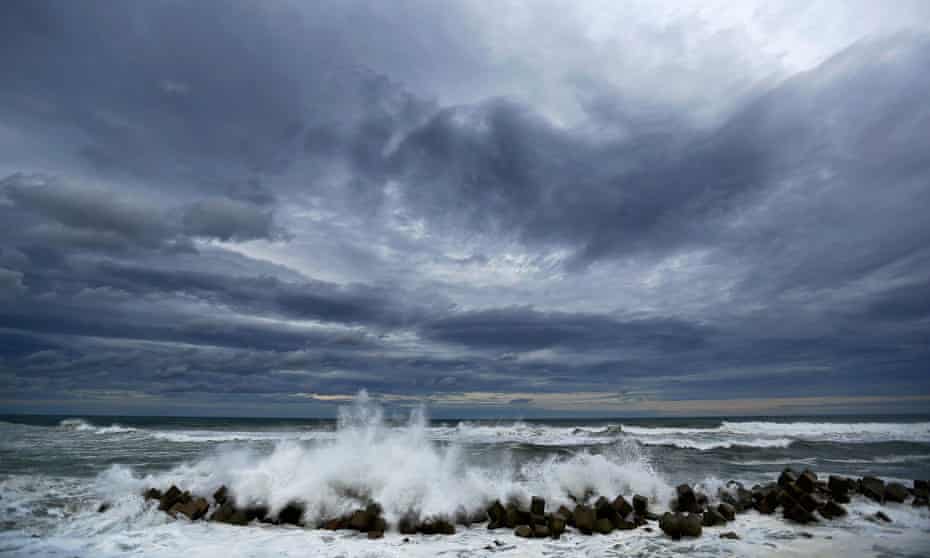 Waves break into anti-tsunami barriers