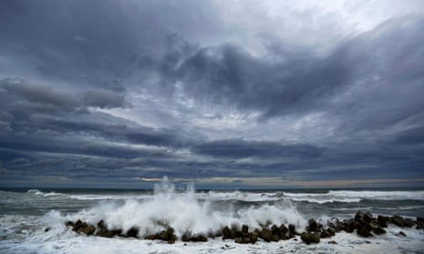 Waves break into the anti-tsunami barriers