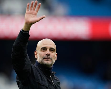 Pep Guardiola waves to the crowd
