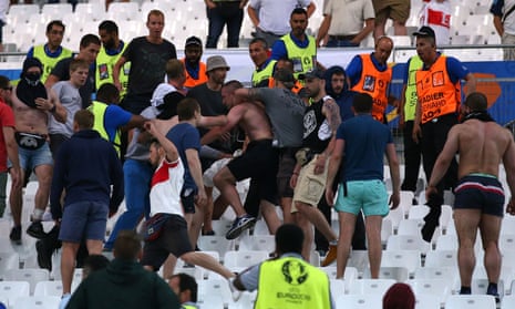 Fans clash after the Euro 2016 match between England and Russia in Marseille.