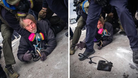 It's about freedom of the press': photographer tackled by ICE throws camera to save it – video | Minneapolis | The Guardian