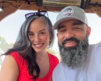 a man and a woman smile