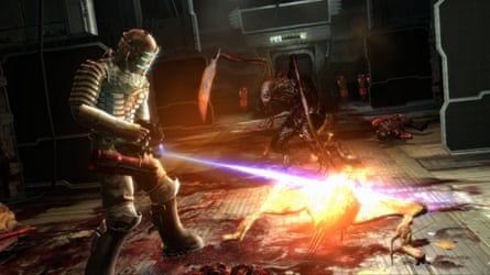 A screenshot of 2008 video game Dead Space, featuring a helmeted person firing at an alien creature on the ground, while another creature advances.