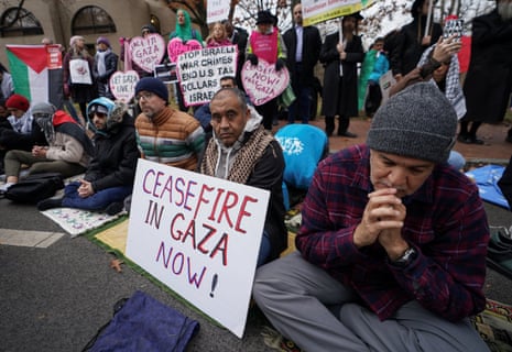 Pro-Palestinian demonstrators hold a prayer vigil and rally outside the Israeli embassy in Washington DC.