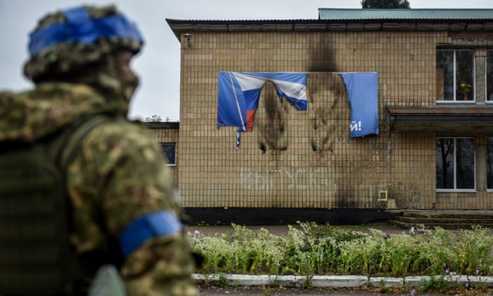 A burnt banner with the Russian flag in Kharkiv, Ukraine.