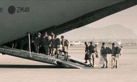 Soldiers board a plane to leave Afghanistan.