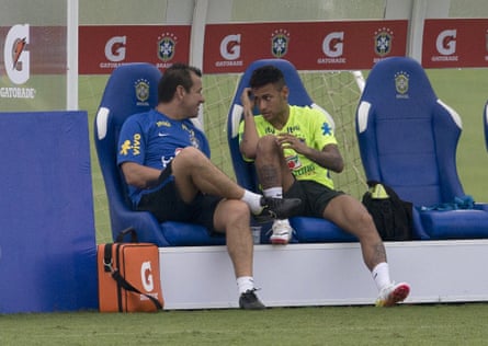 Dunga talks with Neymar after training in Teresopolis.