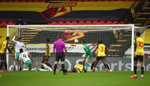 Chris Mepham (second left) gets a share of the spoils for Bournemouth.