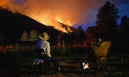 Villagers of Whitecroft, British Columbia, watch the Embleton Mountain wildfire rip down the mountain towards the edge of the village in 2021.