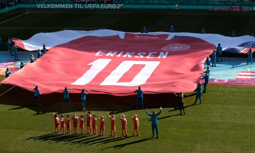 A tribute for Christian Eriksen takes places before Denmark’s Euro 2020 match against Belgium.