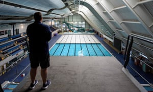 Leisure centre manager Ryan Walker inspects the swimming pool hall of the Manchester Aquatics Centre before reopening.