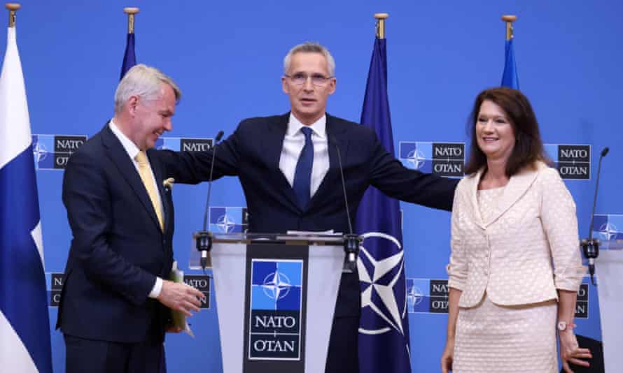 Nato Secretary General Jens Stoltenberg (C) with Finnish Foreign Minister Pekka Haavisto (L) and Swedish Ministry for Foreign Affairs Anne Linde