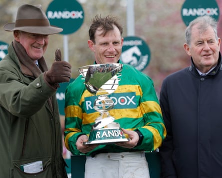 Jockey Paul Townend is flanked by trainer Willie Mullins (left) and owner JP McManus (right) after victory with I Am Maximus