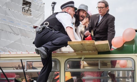 Police wielded batons and against Extinction Rebellion protesters as they battled to gain control of an open-top bus blocking London Bridge