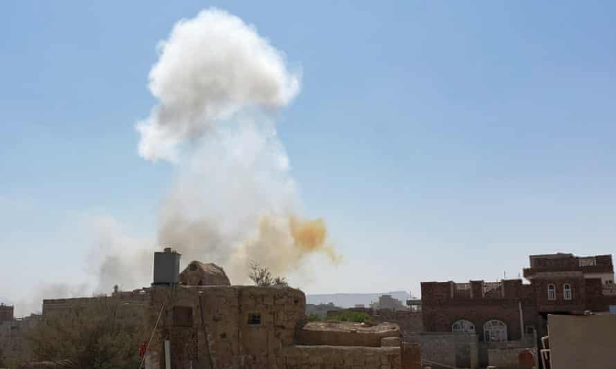 Smoke rises after Saudi-led airstrikes on an army base in Sanaa, Yemen.