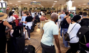 British tourists return home from the Spanish island of Tenerife as quarantine for people arriving from the country is imposed in the UK.