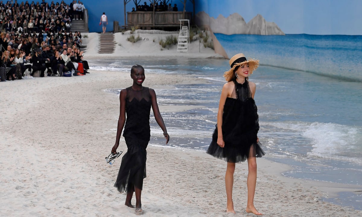 Karl Lagerfeld makes waves with catwalk beach at Chanel show | Chanel | The Guardian Karl Lagerfeld makes waves with catwalk beach at Chanel show | Chanel | The Guardian