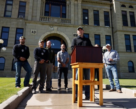 Austin Knudsen, Montana’s attorney general, speaks to press outside a courthouse