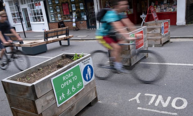 A cyclist passes through the barriers of a low-traffic neighbourhood in Dulwich, south London.