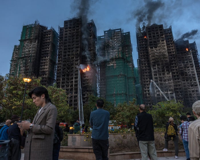 Hong Kong fire: death toll rises to 83 as rescue crews search for survivors in still-burning towers – as it happened