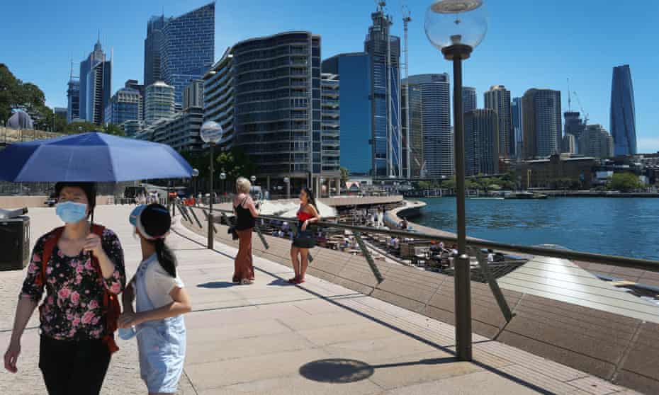People visit the Sydney Opera House on 15 December 15, 2021
