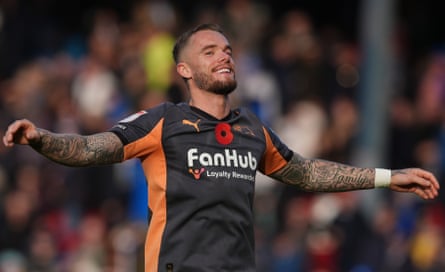 Derby’s Joe Ward celebrates aft nan last whistle astatine Ewood Park