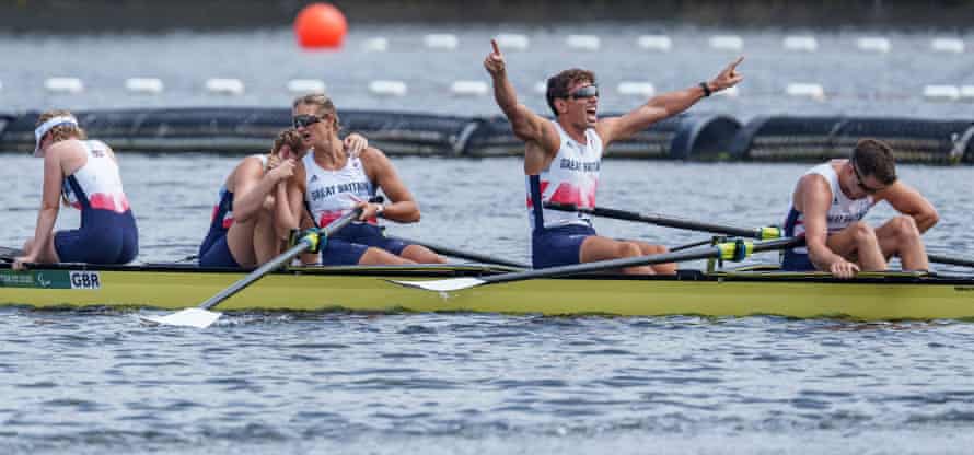 The four Brits celebrate gold in the four mixed coxed