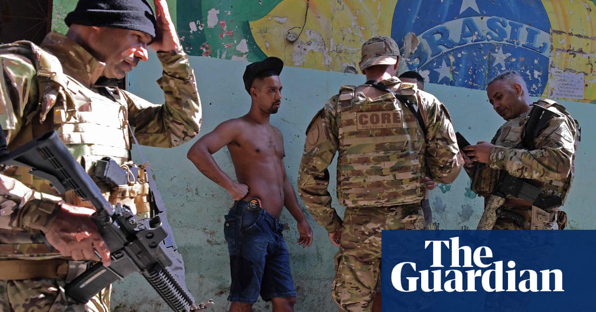 Heavily armed police launch bid to reclaim control of Rio de Janeiro favela | Rio de Janeiro | The Guardian