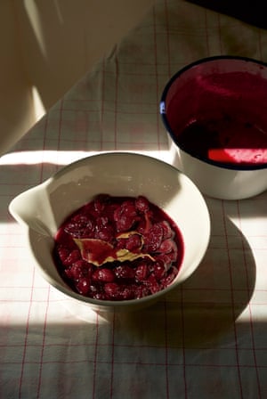 sour cherries steeped in wine with bay leaves