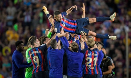 Jordi Alba gets a send-off from his Barcelona teammates at his final Camp Nou appearance last month.