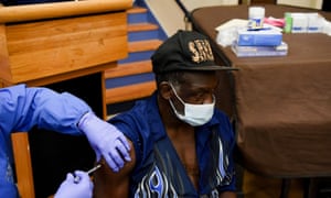 A man receives a Covid vaccine in Houston, Texas.