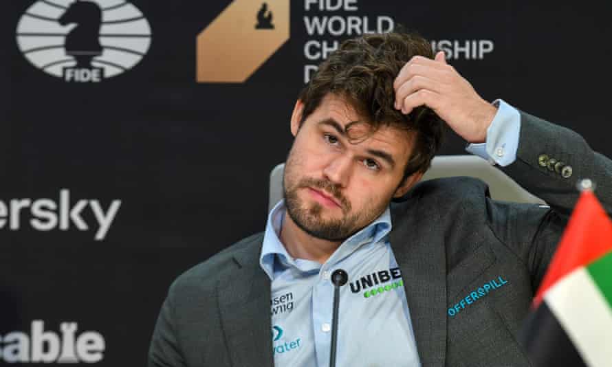 FIDE World Chess Championshipepa09634569 Defending champion Magnus Carlsen of Norway reacts during a press conference after winning the FIDE World Chess Championship against Ian Nepomniachtchi of Russia at the EXPO 2020 Dubai in Dubai, United Arab Emirates, 10 December 2021. EPA/YOSHUA ARIAS
