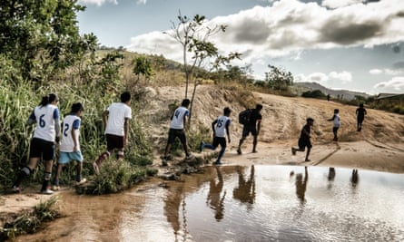 Young people of the Macuxi tribe in Uiramutã going to play football.