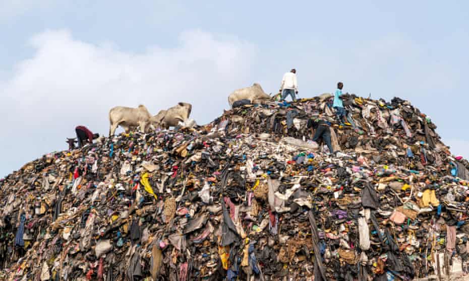 Unsellable imported used clothes rot at a dump in Accra, Ghana, in March.