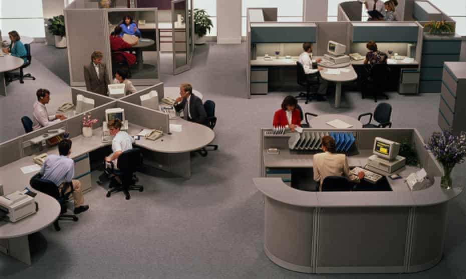 Open-plan office, people working at terminals