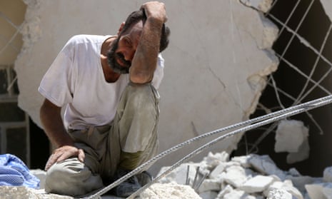 Man in tears after air strike on eastern Aleppo