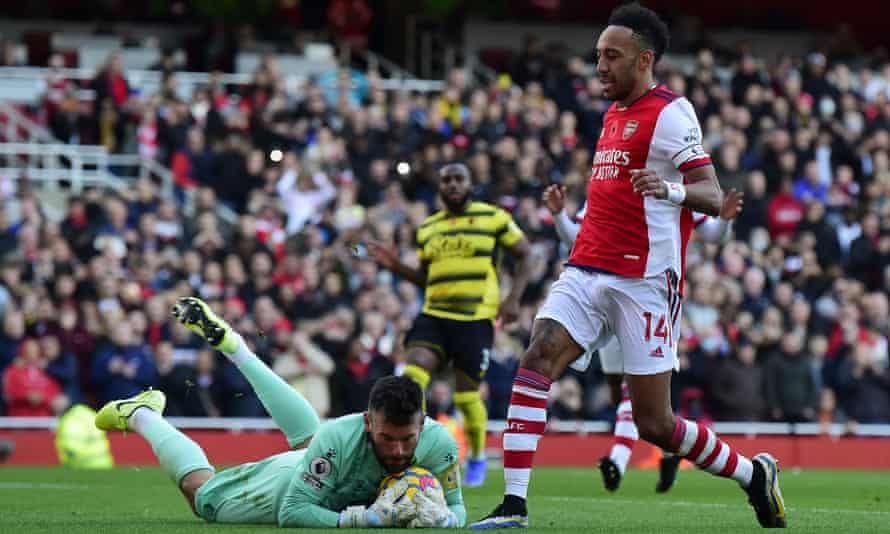 Pierre-Emerick Aubameyang’s penalty is saved by Watford goalkeeper Ben Foster.