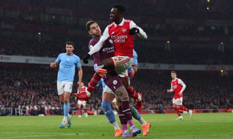 Ederson of Manchester City fouls Eddie Nketiah of Arsenal resulting in a penalty.