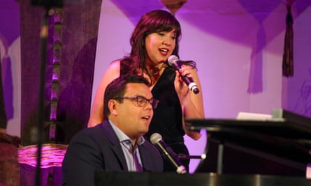 Robert Lopez and Kristen Anderson-Lopez performing together in 2017 in San Francisco.