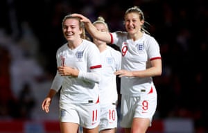 Lauren Hemp celebrates scoring the eighth England goal.