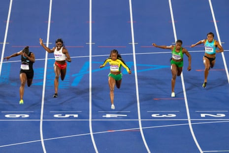 Elaine Thompson-Herah of Jamaica wins the women’s 100m final (centre), the silver medal went to Saint Lucia’s Julien Alfred (left), England’s Daryll Neita (second left) took bronze.