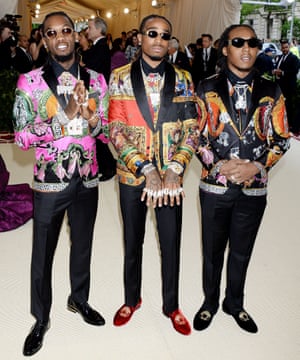 Hip hop trio Migos went for bold sequinned Versace suits, offset by bling, bling and a bit more bling. The rappers Quavo, Offset, and Takeoff are long time fans of the Italian house - their 2013 debut single was entitled Versace.